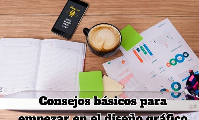 mesa-llena-de-papeles-colores-y-un-telefono-movil