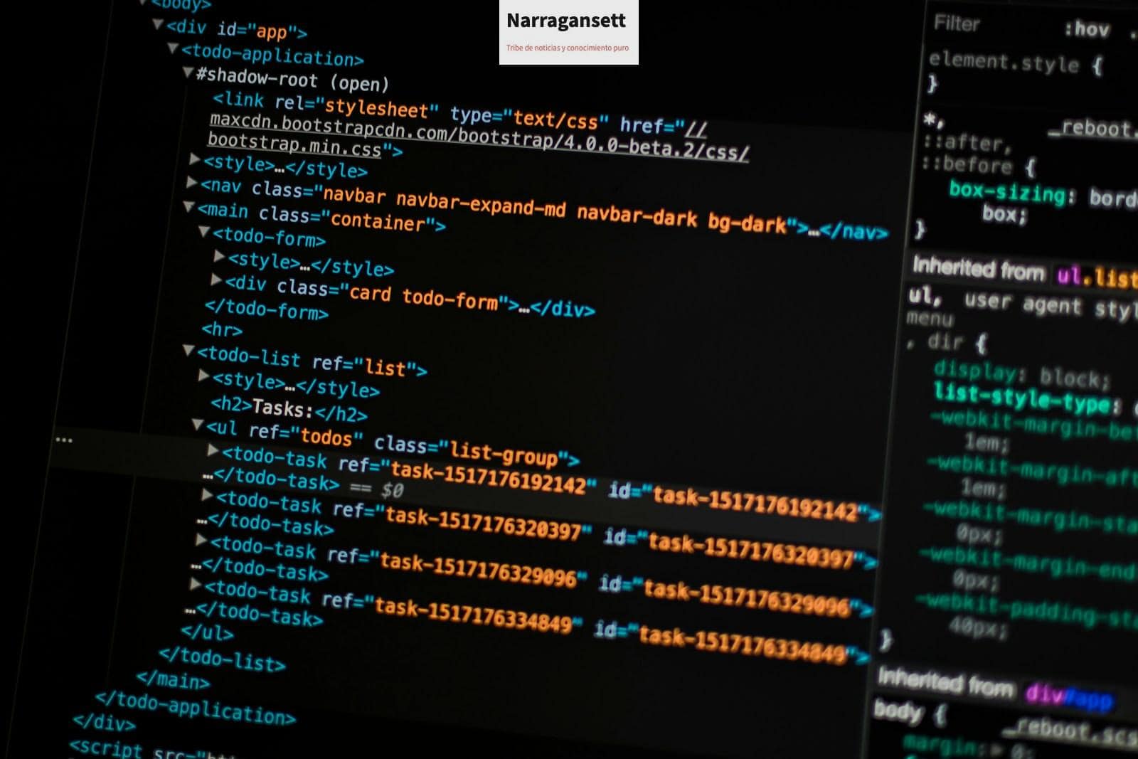 turned on monitor displaying programming language