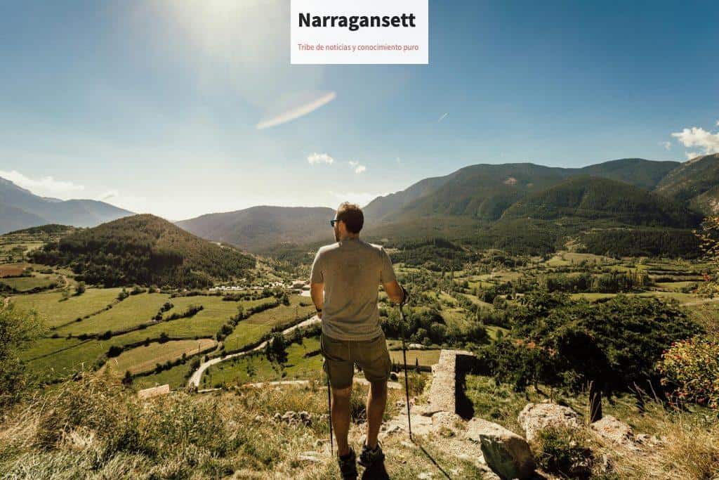 Man Walking on Mountain Trail