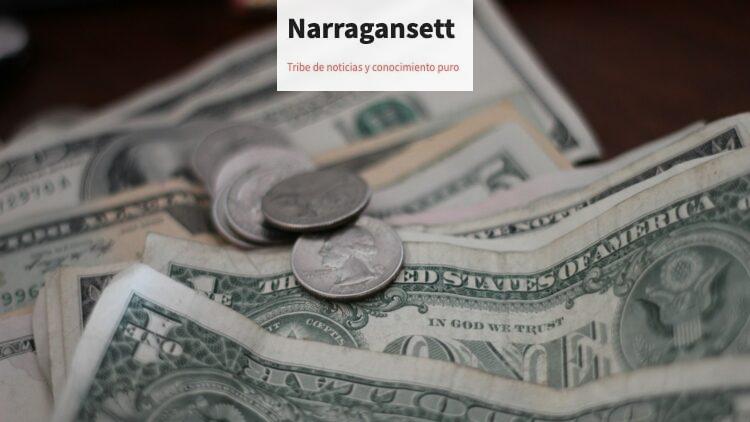 photo of dollar coins and banknotes