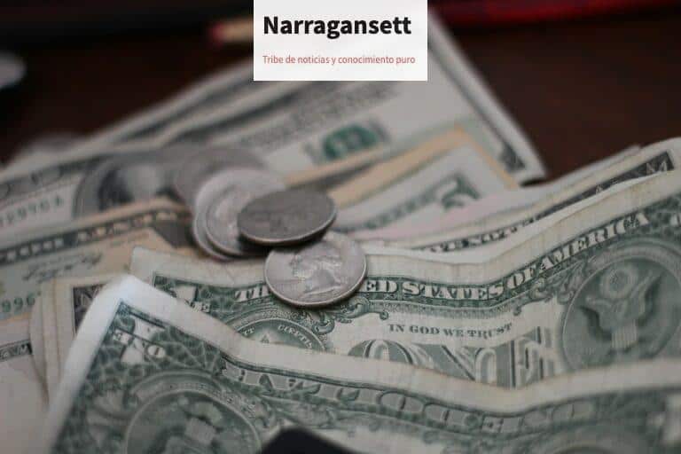 photo of dollar coins and banknotes