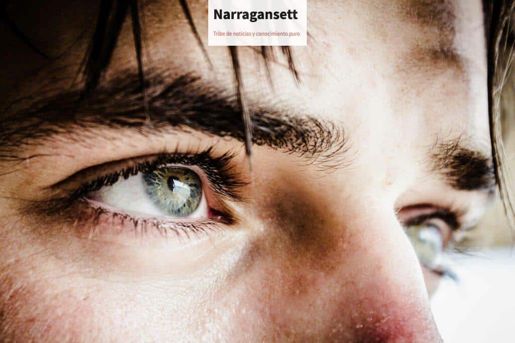 close up photo of gray-eyed man
